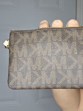 Michael Kors Brown Monogram Zip Wristlet with Gold Hardware